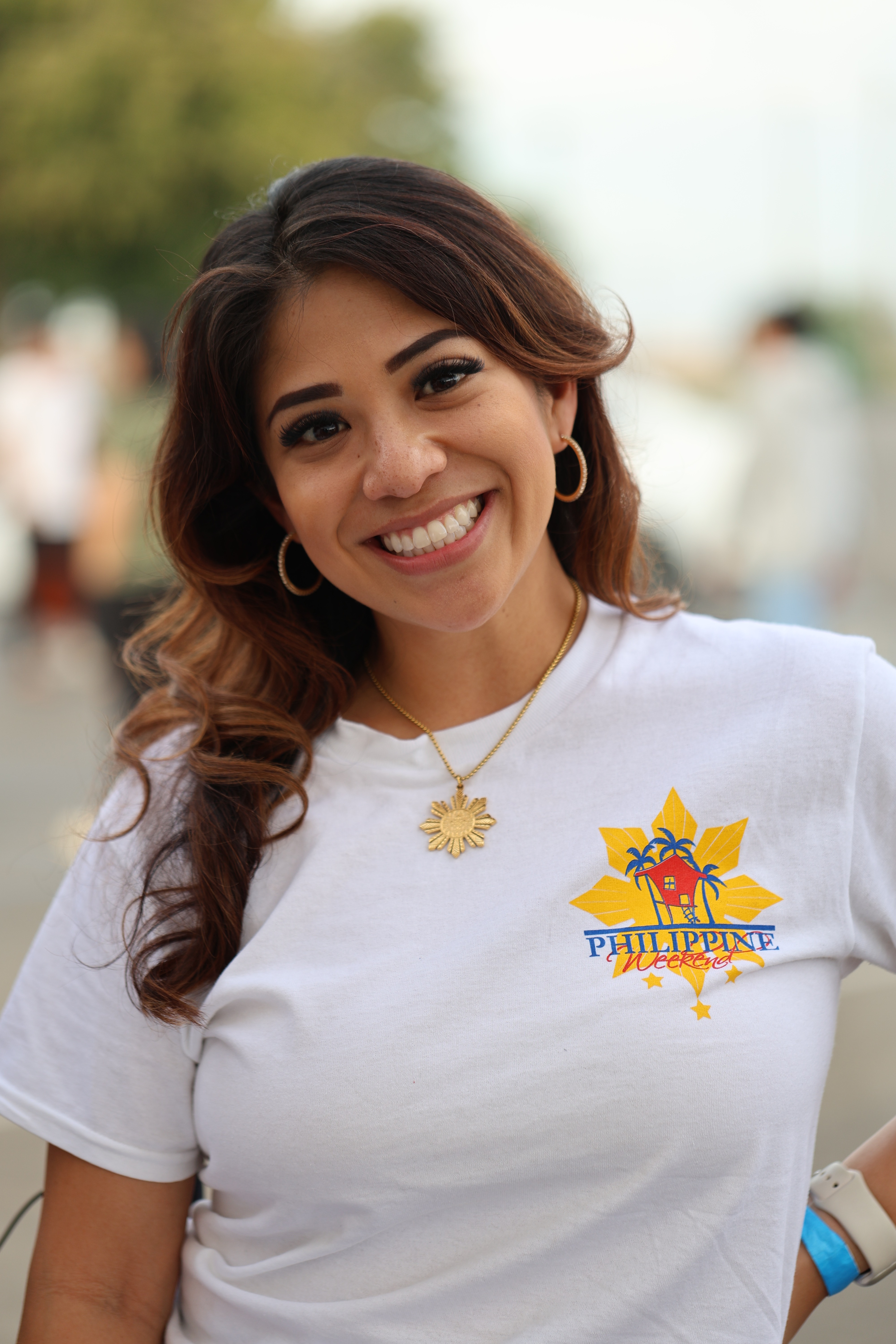 Woman wearing Gold Lakas Tribal Necklace from Philippine Weekend in Delano