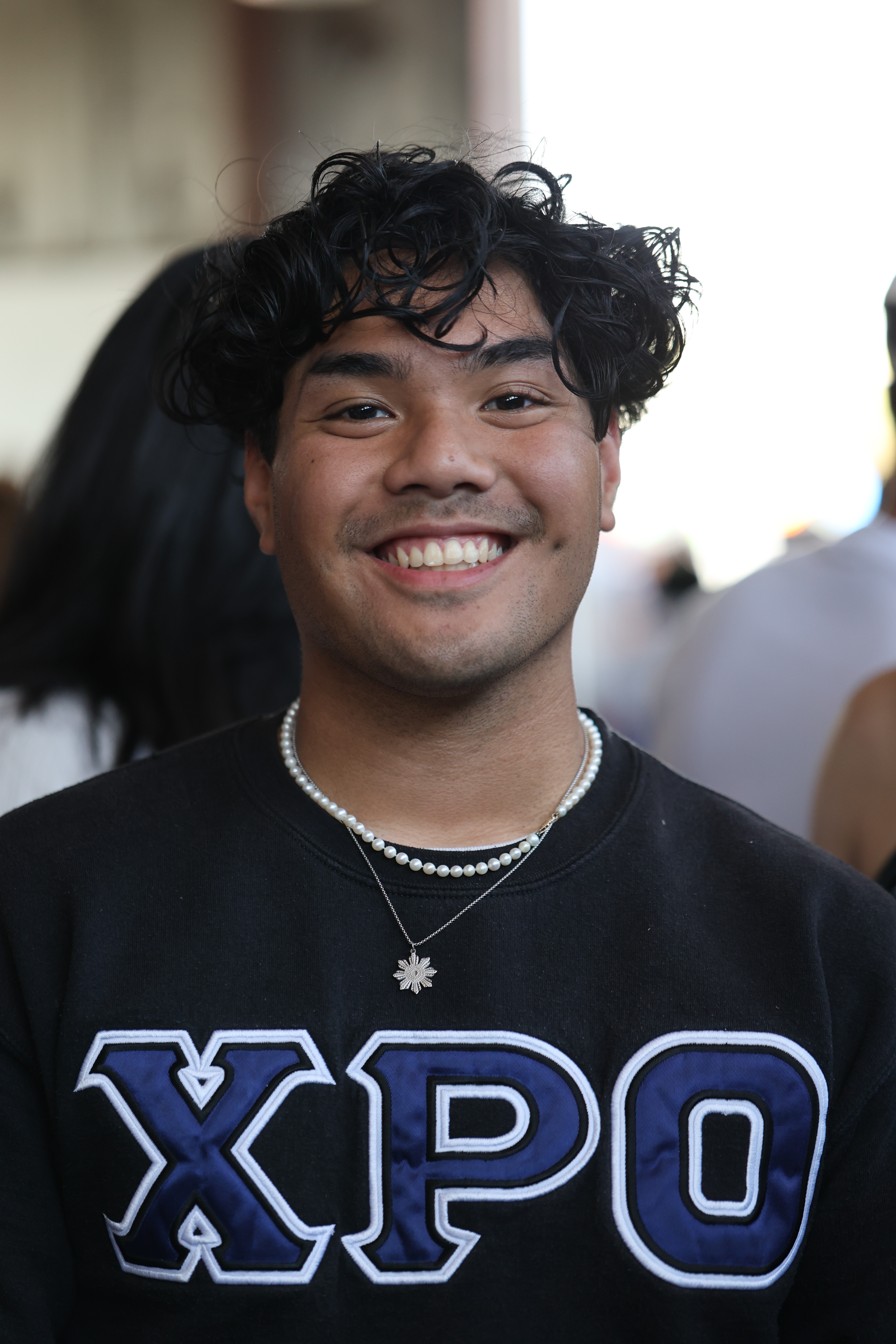 Young man wearing the steel Diwa Tribal Necklace at Philippine Weekend in Delano